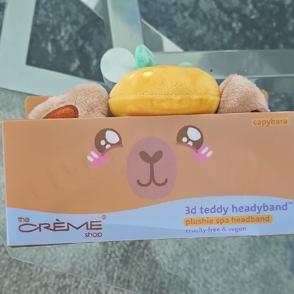 The Crème Shop Capybara Plushie Spa Headband - Yellow and Brown